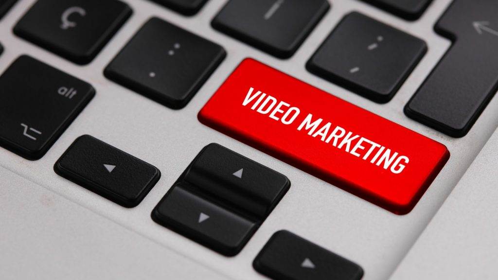 keyboard with red video marketing button